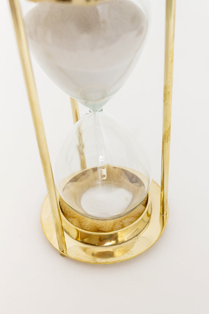 Zandloper van messing en glas