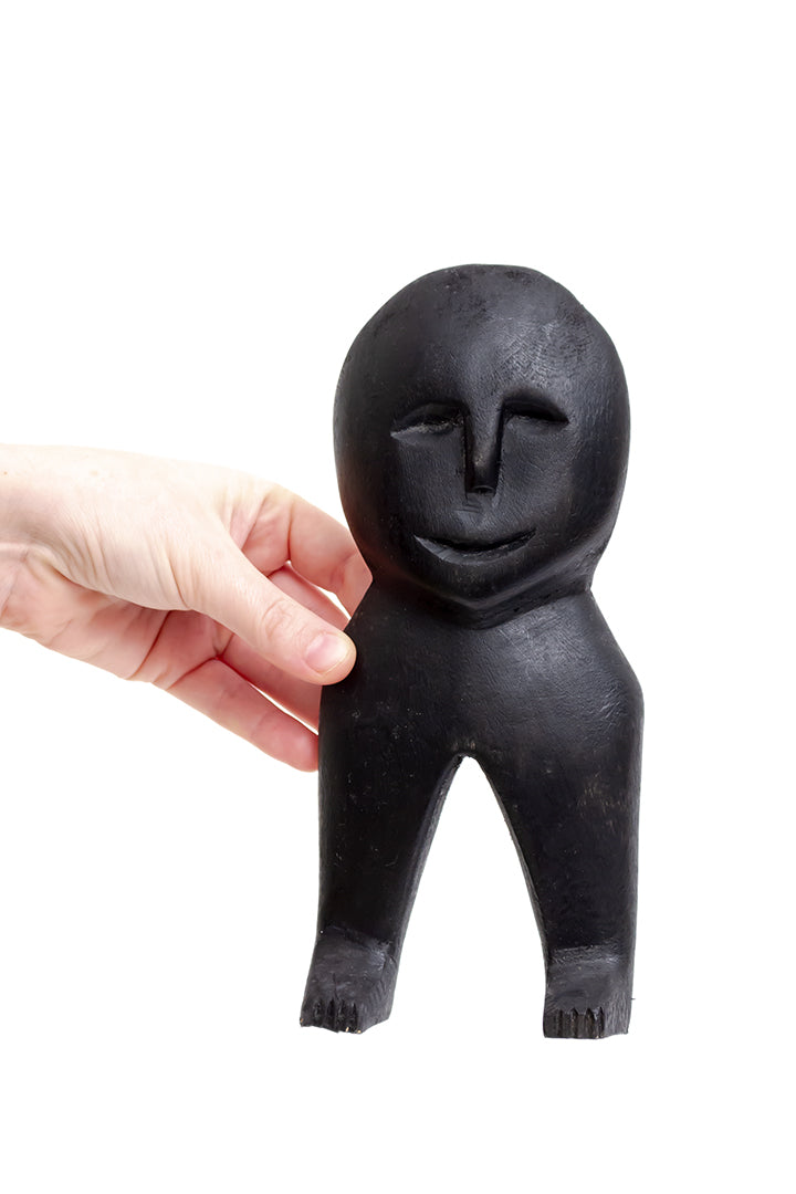 Zwart houten masker met benen Kenia