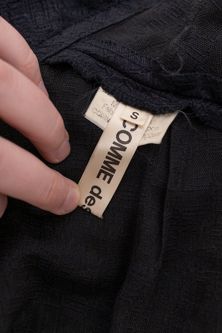 Zwarte jurk Comme des Garçons 2000 met camouflageprint en plastic bies