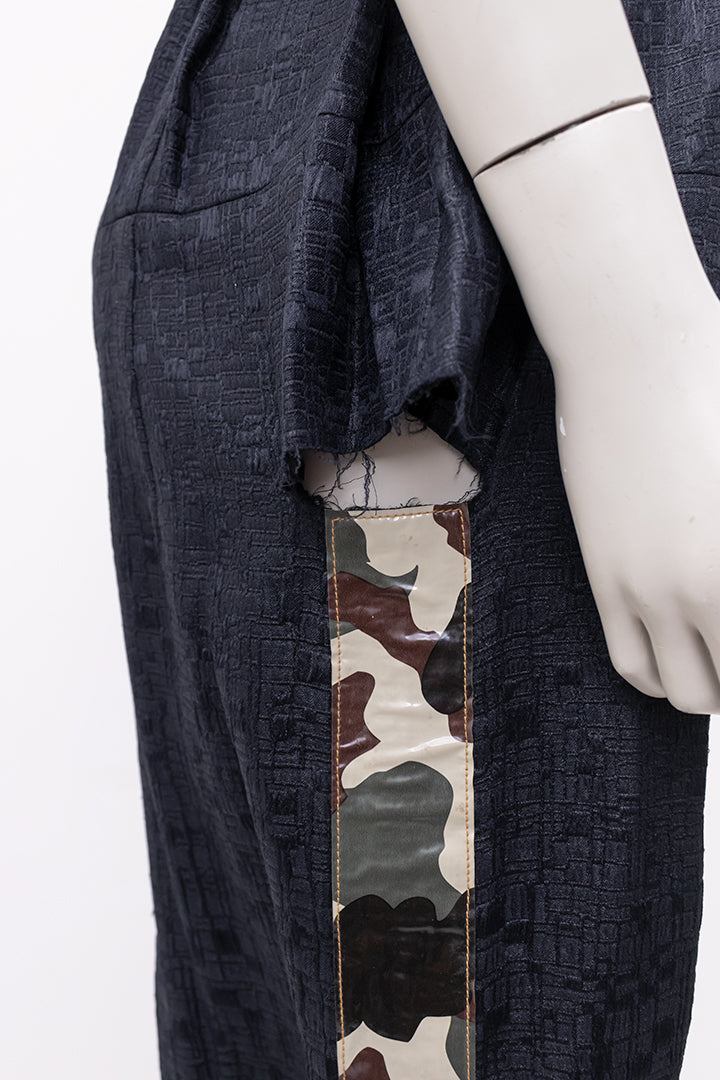 Zwarte jurk Comme des Garçons 2000 met camouflageprint en plastic bies