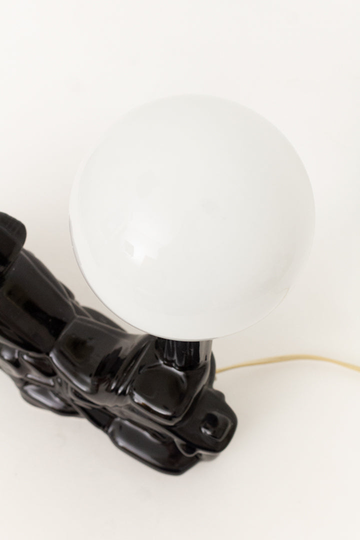 Zwarte motor lamp van keramieken met glazen bol jaren 80