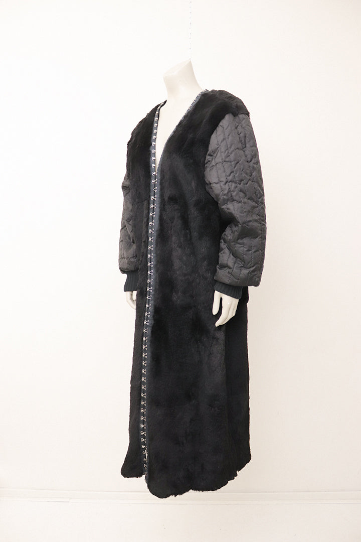 Zwarte vintage Jean Paul Gaultier Junior bontjas met gewatteerde mouwen