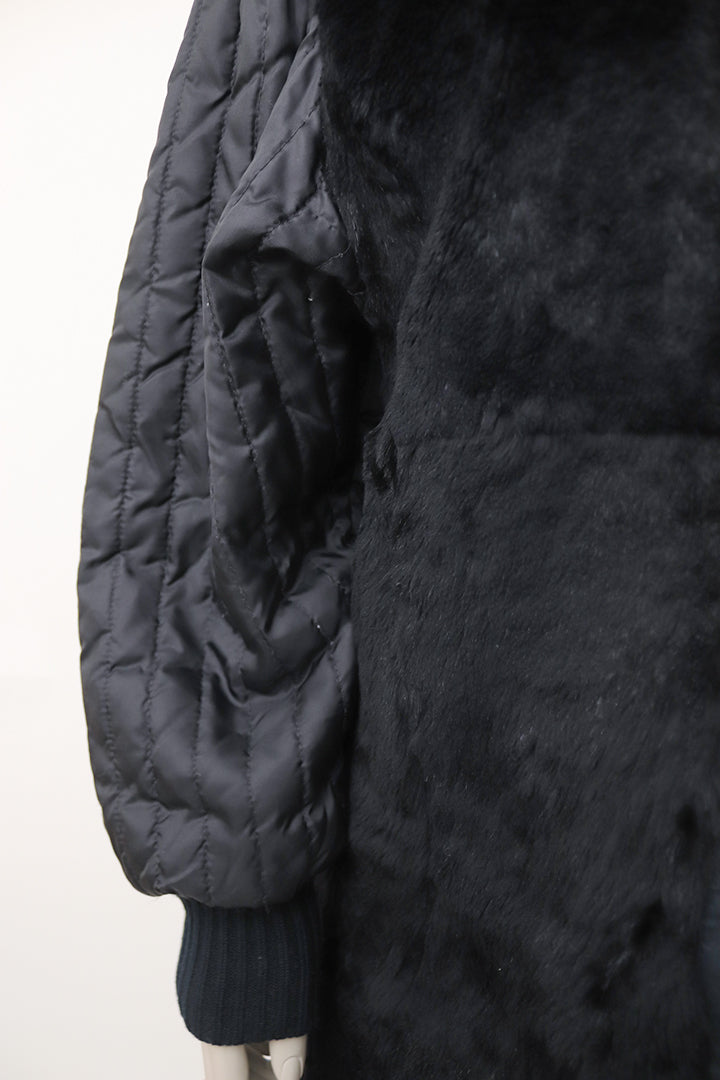 Zwarte vintage Jean Paul Gaultier Junior bontjas met gewatteerde mouwen