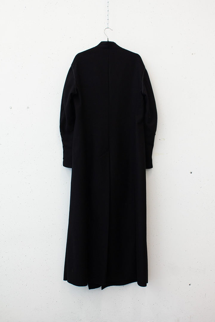 Zwarte wollen Dries van Noten jas knoopjes detail