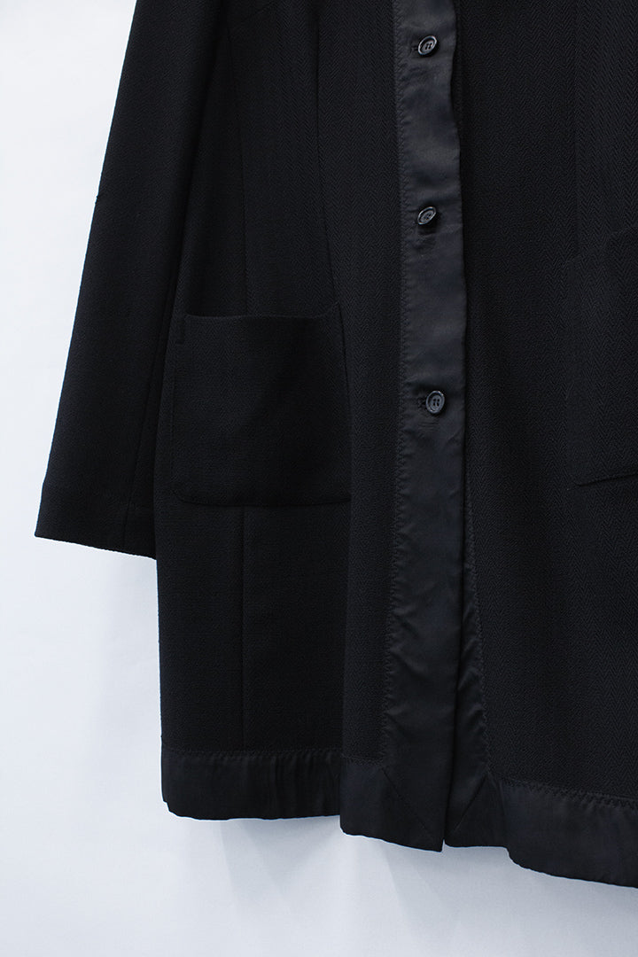 Zwarte wollen Dries van Noten jasje met knopen en satijnen band