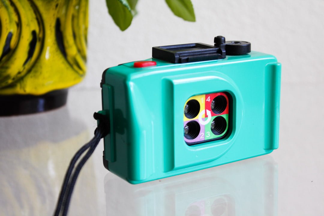 Groene vintage action sampler camera
