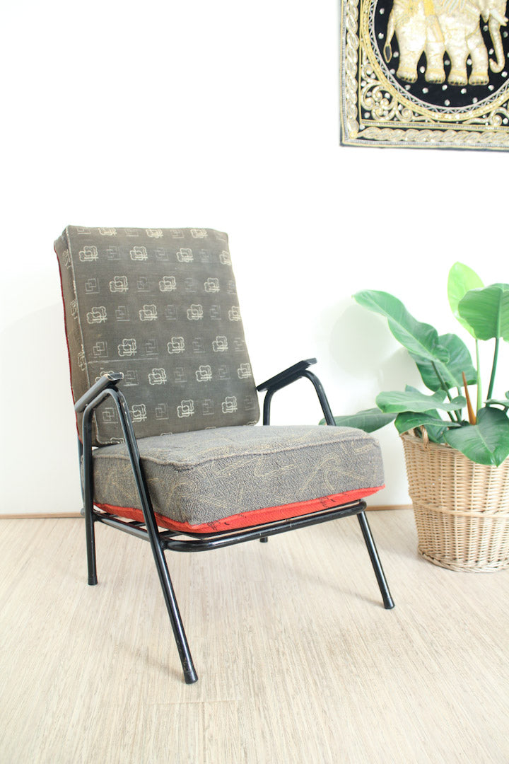 Zwart buisframe vintage fauteuil