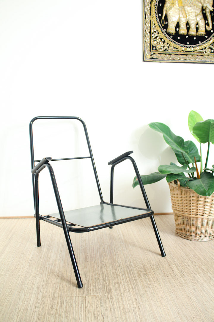 Zwart buisframe vintage fauteuil