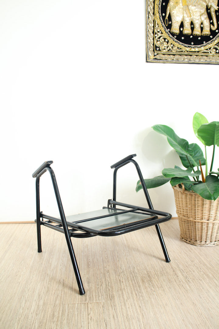 Zwart buisframe vintage fauteuil