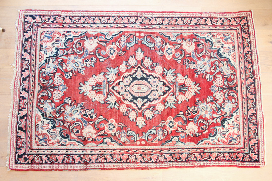 Vintage Oosters vloerkleed roze / rood gebloemd