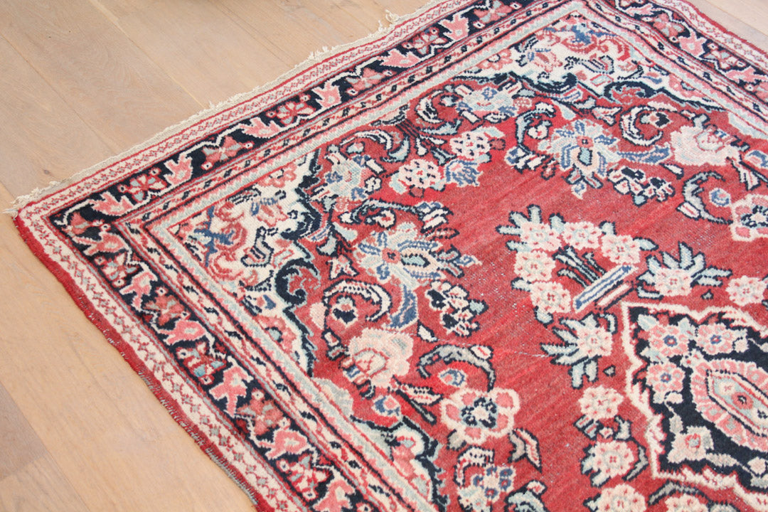 Vintage Oosters vloerkleed roze / rood gebloemd
