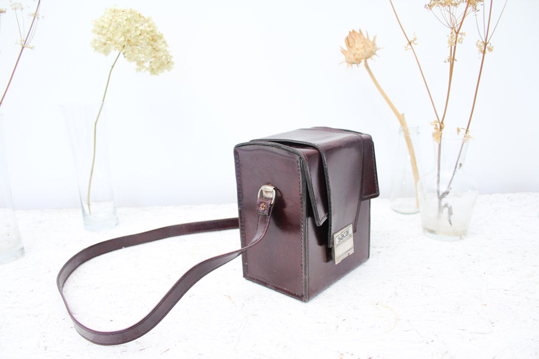 Bruine vintage Polaroid Sacar cameratas
