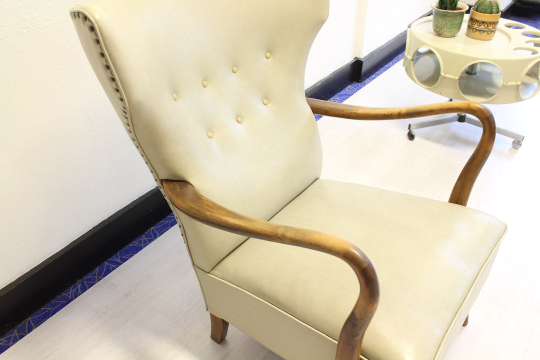 Creme witte vintage oorfauteuil jaren 50