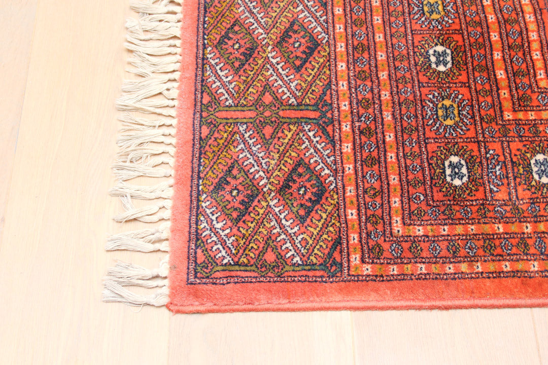 Vintage Bokhara Perzisch vloerkleed oranje / rood 173 x 115 cm