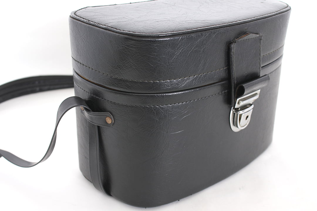 Zwarte vintage camerakoffer met gele voering